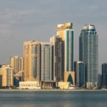 Sharjah skyline showing top residential areas with highest rental ROI in 2026