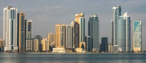 Sharjah skyline showing top residential areas with highest rental ROI in 2026
